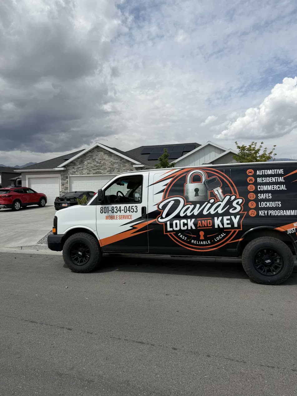 David's wrapped van parked on a residential street on a house call